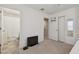 Bedroom with TV and en-suite bathroom at 8841 Walnut Gable Ct, Riverview, FL 33578