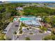 Aerial view of community pool, clubhouse, and playground at 8841 Walnut Gable Ct, Riverview, FL 33578