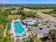 Aerial view of community pool with adjacent playground at 8841 Walnut Gable Ct, Riverview, FL 33578