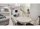 Small dining area with round table and four chairs at 8841 Walnut Gable Ct, Riverview, FL 33578