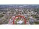 Wide aerial showcasing the property's location within the neighborhood at 908 E Gilchrist St, Plant City, FL 33563