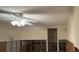 Unfinished bedroom with ceiling fan at 9524 Treasure Ne Ln, St Petersburg, FL 33702