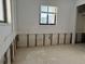 Unfinished bedroom with water damaged walls at 9524 Treasure Ne Ln, St Petersburg, FL 33702