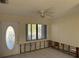 Home entryway with damaged walls and flooring at 9524 Treasure Ne Ln, St Petersburg, FL 33702