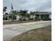 Ranch-style home with a spacious yard at 9524 Treasure Ne Ln, St Petersburg, FL 33702
