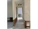 Hallway with water damage and exposed framing at 9524 Treasure Ne Ln, St Petersburg, FL 33702