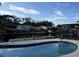 Relaxing pool area with water views at 9524 Treasure Ne Ln, St Petersburg, FL 33702