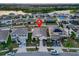 Aerial view showcasing the house's location within a residential community at 12017 Gillingham Harbor Ln, Gibsonton, FL 33534