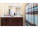 Bathroom with double vanity and shower/tub combo at 12017 Gillingham Harbor Ln, Gibsonton, FL 33534