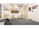 Bedroom with a king-size bed and geometric wall decor at 12017 Gillingham Harbor Ln, Gibsonton, FL 33534