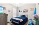 Baseball-themed bedroom with a full-size bed at 12017 Gillingham Harbor Ln, Gibsonton, FL 33534