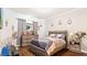 Bright bedroom with a dresser and a comfortable bed at 12017 Gillingham Harbor Ln, Gibsonton, FL 33534