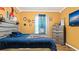 Bedroom with a full-size bed and boxing theme decor at 12017 Gillingham Harbor Ln, Gibsonton, FL 33534