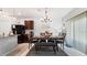 Dining area with a table and bench seating, near the kitchen at 12017 Gillingham Harbor Ln, Gibsonton, FL 33534