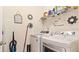 Laundry room with washer, dryer, and ample storage at 12017 Gillingham Harbor Ln, Gibsonton, FL 33534