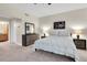 Comfortable bedroom featuring a king-size bed and ample dresser space at 12077 Gandy N Blvd # 344, St Petersburg, FL 33702