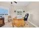 Home office with ornate desk and comfortable chair at 12077 Gandy N Blvd # 344, St Petersburg, FL 33702