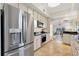 Modern kitchen with stainless steel appliances and granite countertops at 12077 Gandy N Blvd # 344, St Petersburg, FL 33702