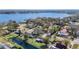Aerial view showcasing the property's desirable waterfront location near a lake at 1210 Lady Elaine Dr, Valrico, FL 33594