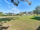 Large backyard with water view, offering privacy and tranquility at 1210 Lady Elaine Dr, Valrico, FL 33594