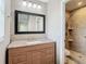Updated bathroom with granite countertop and tiled shower at 1210 Lady Elaine Dr, Valrico, FL 33594
