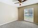 Bedroom featuring a window with blinds and ceiling fan at 1210 Lady Elaine Dr, Valrico, FL 33594