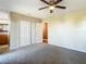 Comfortable bedroom with carpet flooring and a large closet at 1210 Lady Elaine Dr, Valrico, FL 33594