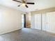 Serene bedroom with carpet flooring and backyard access at 1210 Lady Elaine Dr, Valrico, FL 33594