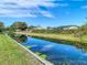 Scenic view of a canal with clear water and blue sky at 1210 Lady Elaine Dr, Valrico, FL 33594