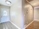 Neutral-toned entryway with tile flooring and a door with glass accents at 1210 Lady Elaine Dr, Valrico, FL 33594