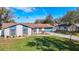 Single-story home with light-colored exterior and landscaping at 1210 Lady Elaine Dr, Valrico, FL 33594