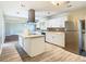 Updated kitchen with stainless steel appliances and white cabinets at 1210 Lady Elaine Dr, Valrico, FL 33594
