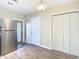 Eat-in kitchen with stainless steel refrigerator and white cabinets at 1210 Lady Elaine Dr, Valrico, FL 33594