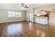 Spacious living room featuring hardwood floors and a ceiling fan at 1210 Lady Elaine Dr, Valrico, FL 33594