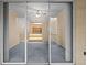 View from balcony showcasing access to the living area at 17108 Carrington Park Dr # 710, Tampa, FL 33647