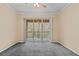 Bedroom with sliding glass doors leading to balcony at 17108 Carrington Park Dr # 710, Tampa, FL 33647