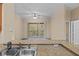 Kitchen with granite countertops and view of balcony at 17108 Carrington Park Dr # 710, Tampa, FL 33647