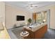 Bright living room with balcony access and modern furnishings at 17108 Carrington Park Dr # 710, Tampa, FL 33647