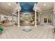 Community clubhouse lobby with seating area and pool view at 17108 Carrington Park Dr # 710, Tampa, FL 33647