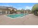 Inviting community pool with surrounding patio at 17108 Carrington Park Dr # 710, Tampa, FL 33647