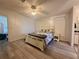 Bedroom with light wood double bed frame and light wood flooring at 209 N Saint Thomas Cir, Apollo Beach, FL 33572