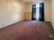 Spacious bedroom with ample closet space and neutral carpeting at 209 N Saint Thomas Cir, Apollo Beach, FL 33572