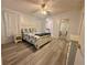 Main bedroom with floral bedding and plenty of closet space at 209 N Saint Thomas Cir, Apollo Beach, FL 33572