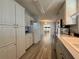 Well-equipped kitchen with ample cabinetry and modern appliances at 209 N Saint Thomas Cir, Apollo Beach, FL 33572