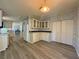 Galley kitchen with lots of storage and breakfast bar at 209 N Saint Thomas Cir, Apollo Beach, FL 33572