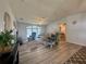 Bright and spacious living room with new flooring and lots of natural light at 209 N Saint Thomas Cir, Apollo Beach, FL 33572
