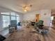 Open concept living room featuring a sofa and two armchairs at 209 N Saint Thomas Cir, Apollo Beach, FL 33572