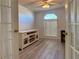 Bright home office with built-in shelving and French doors at 209 N Saint Thomas Cir, Apollo Beach, FL 33572