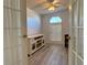 Home office featuring built-in shelving and French doors at 209 N Saint Thomas Cir, Apollo Beach, FL 33572