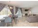 Bright living room boasts a fireplace, built-in shelving, and sliding glass doors to the lanai at 23635 Oakside Blvd, Lutz, FL 33559
